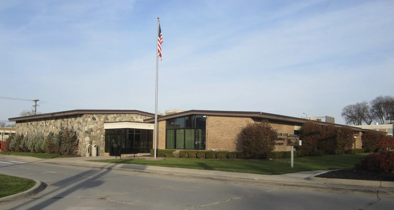 The Clawson community building on a clear day